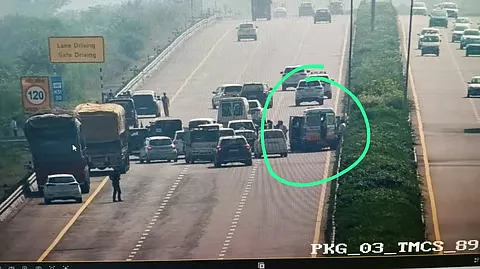The accident site on the Purvanchal Expressway, with the ambulance and convoy vehicles bunched up.