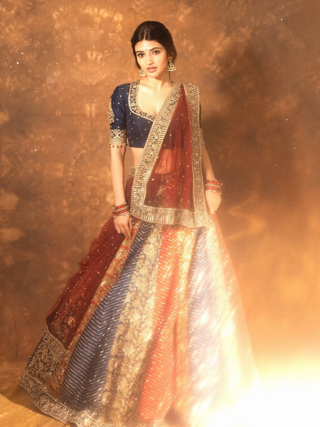 Srilila's royal style in blue-maroon lehenga