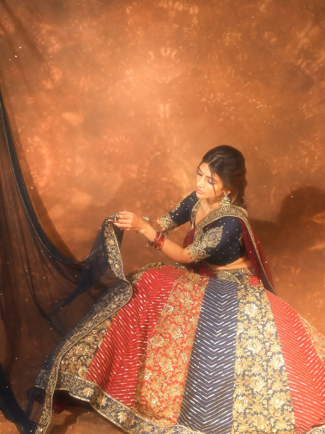 Bindi on forehead, earrings… Srilila in a desi look
